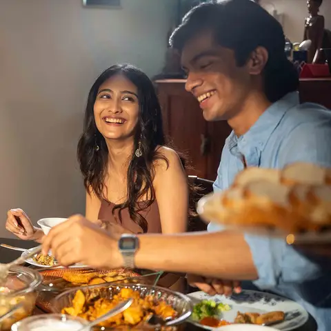 Learn the story of dishes served and the blend of regional and pan-Indian influences that shape this evolving culinary tradition.